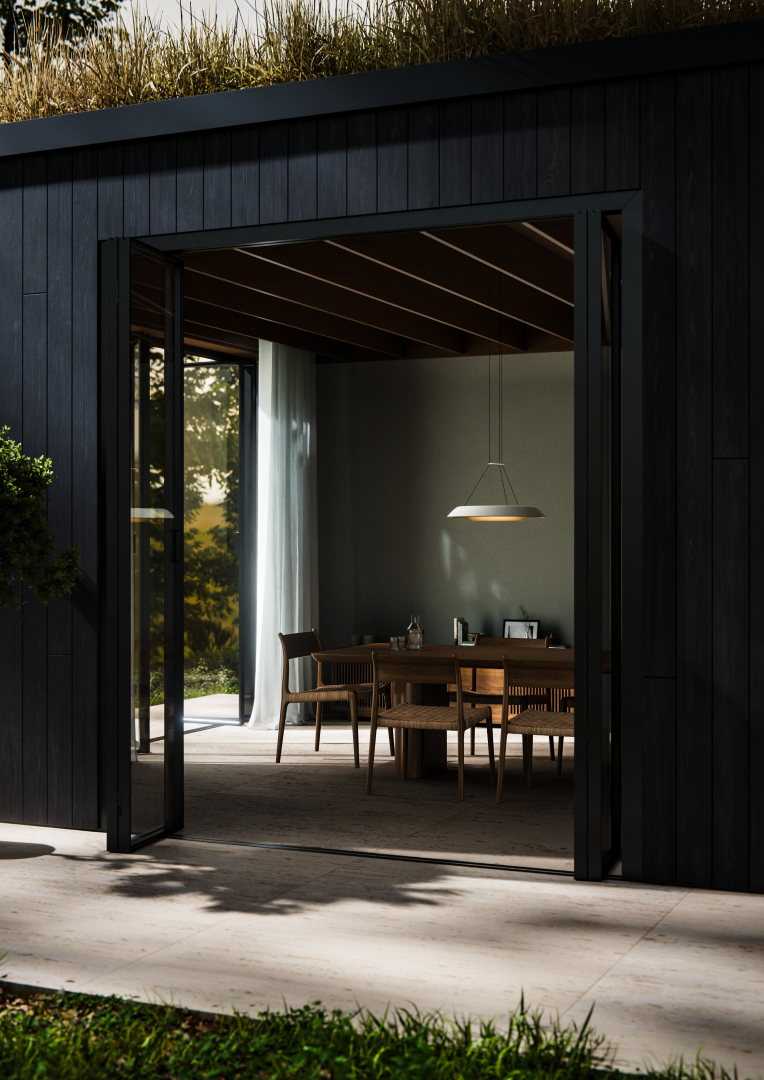 Overhead view of Plusminus pendant lighting by Vibia hanging above a seated lounge area with modern furniture